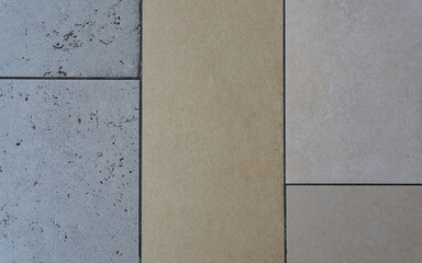 Beige and white tile floor background texture close up