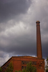 An old abandoned brick factory that recently burned down and only the facade remains