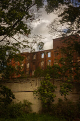 An old abandoned brick factory that recently burned down and only the facade remains