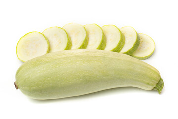Fresh white zucchini with sliced pieces on a white background.