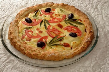 Pizza with cannabis olive oil