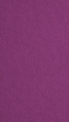 The surface of violet cardboard. Paperboard mobile phone wallpaper. Paper texture with cellulose fibers. Bright textured vertical background. Top-down. Macro