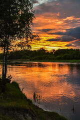 Fototapeta na wymiar Lower Narew Valley, sunset on the Narew River, Łomża, Poland