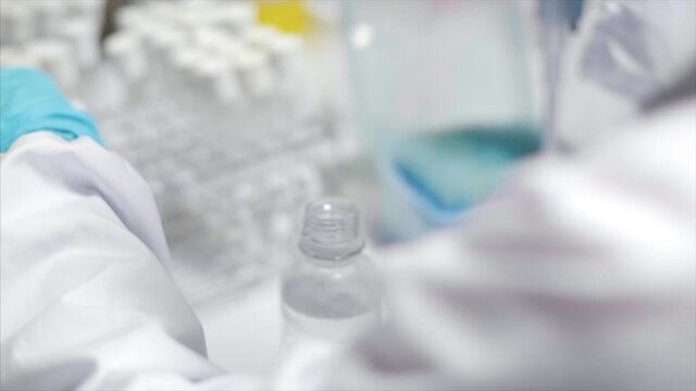 Scientist works on formulas in the laboratory.
