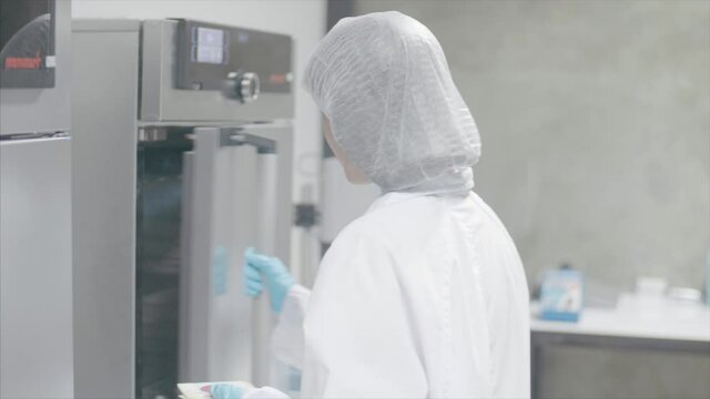 Scientist works on formulas in the laboratory.