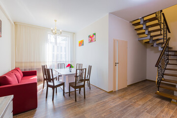 kitchen interior in gray studio with corridor and stairs