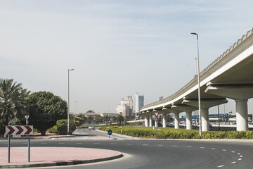 Modern UAE Dubai Cityscape Architecture Construction Buildings with Blue Sky and Highway Road