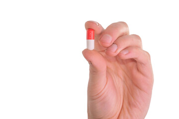 tablet capsule is held in the hand with your fingers