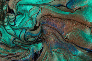 Beautiful shimmer turquoise stains of liquid nail polish.Stripy paint texture.Nail lacquer flow...