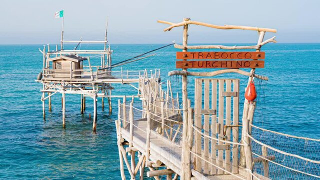 Trabocco Turchino in San Vito Chietino, Abruzzo. Trabucco a sort of Trebuchet, traditional fishing house on Costa dei Trabocchi (Coast Of the Trabocchi) Unesco heritage 4K CINEMATIC CAMERA RAW FOOTAGE