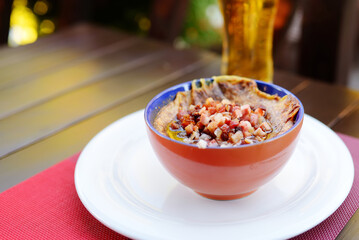 Lithuanian savory potato pudding, known as kugelis or bulviu plokstainis, traditional Lithuanian potato dish.