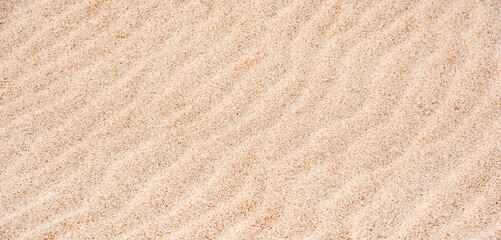Sand dunes and beach texture background. Summer beach concept. Horizontal poster, greeting cards, headers, website.