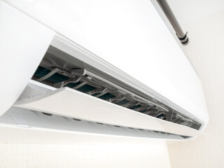 Indoor unit of split air conditioning system, room cooling, heating, close-up, selective focus