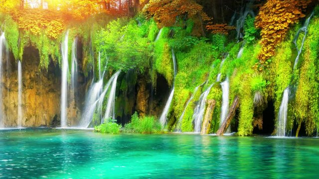 Cinemagraph video of waterfall landscape in Plitvice Lakes Croatia in autumn . Tranquil nature scenery for relaxation background .