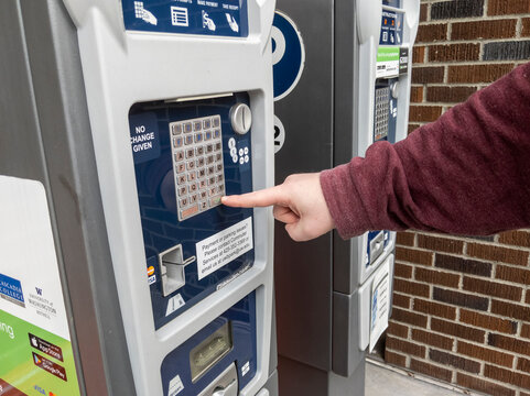 Bothell, WA USA - circa April 2021: Close up view of a public parking payment meter at the University of Washington