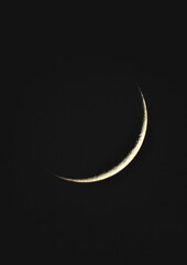 Obraz na płótnie Canvas Crescent moon in the dark night in algeria 