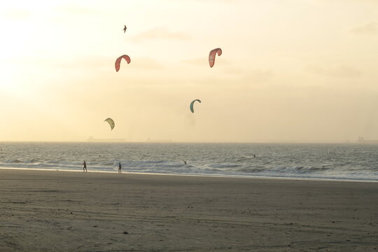 Some colorful ketesurf sails in the air, on a beach on the island of S&atilde;o Lu&iacute;s MA, northeast of Brazil