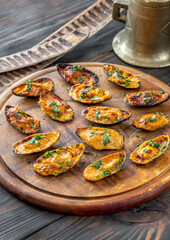 Baked mussels stuffed with cheese