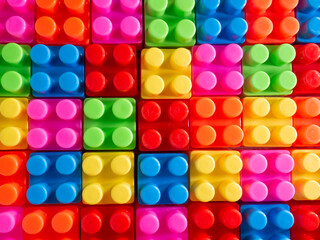The Color toy bricks  on wood table for background or education concept
