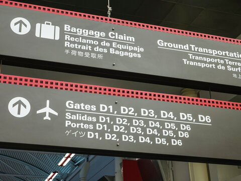 Direction Signs At Louis Armstrong New Orleans International Airport