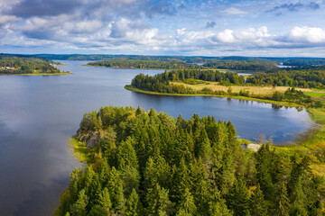 Vuoksa river in Karelia. Northern nature of Russia. Landscape of Karelian Isthmus. Lake Ladoga on summer day. Karelia drone view. Traveling across regions of Russia. Ladoga on background of blue sky