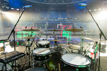 Drum set on a concert stage. Drum kit close-up. Drums and musical instruments on stage. Drum kit...