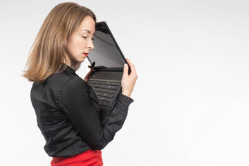 Laptop problem. Tired woman with laptop. Portrait of Ustasha businesswoman. Concept - problems due to computer work. Stress at work.  woman is under stress. Girl with laptop on white background