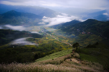 Vietnam mountain pass photograph. Khau Pha mountain pass in Mu Cang Chai, Yen Bai, Vietnam. Along Khau Pha are terraced rice paddies cultivated by H'Mong and Thai ethnic minorities.