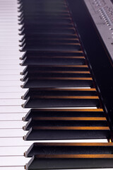 Naklejka premium Close-up of an electronic piano keyboard, soft focus.