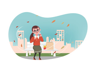 Young woman eating french fries in the park and city view in behind.