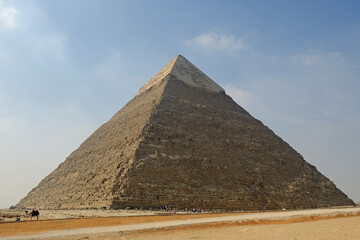Fototapeta na wymiar Egypt Cairo - One face of the Pyramid of Khafre in Giza
