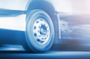 Speed Motion of Semi Truck Wheels Spining. Truck Driving on The Road. Industry Freight Truck...