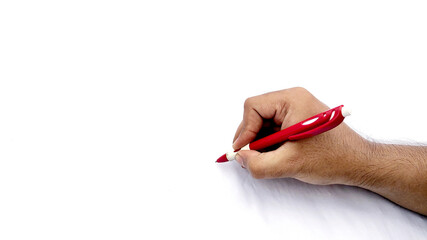 Man's hand holding pen and writing on virtual screen isolated on white background