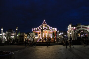 Historical Carousel during night on a amusement fair in Moscow, Russia