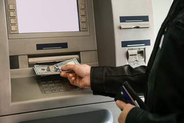 Man withdrawing money from ATM