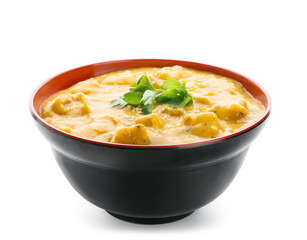 Bowl of tasty chicken curry on white background