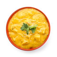 Bowl of tasty chicken curry on white background