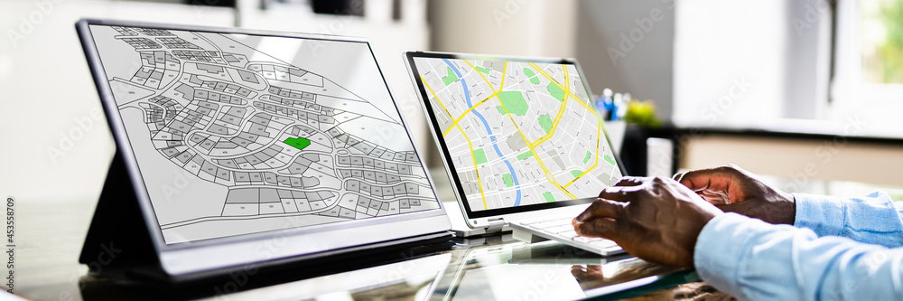 Poster Businessperson Analyzing Cadastre Map On Computer
