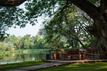 Obraz premium wooden chair in the park