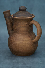   Ceramics, a ceramic product made with your own hands, made on a potter's wheel, a jug, a mug, clay.     