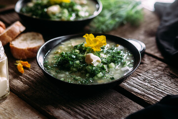 Okroshka in a black plate. Cold soup