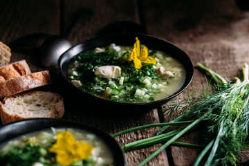 Okroshka in a black plate. Cold soup