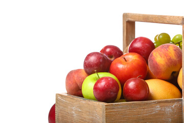 Basket with fresh fruits on white background, closeup