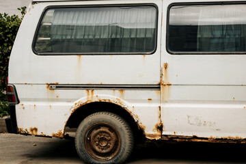 Rusty white minibus