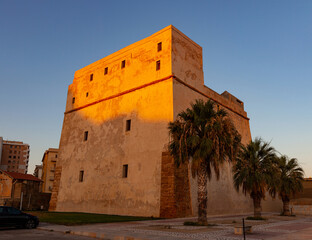 Fortress also called Tower of Charles V at sunset in Porto Empedocle