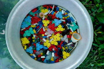 Soviet toys in an aluminum bowl