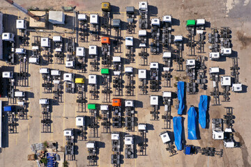 New Truck chassis parked at an import facility, Aerial view.