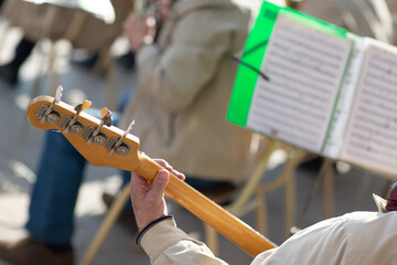 Hands musician plays musical instruments in orchestra