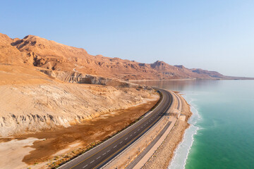 Dead Sea waterfront highway on a beautiful morning, Aerial view.