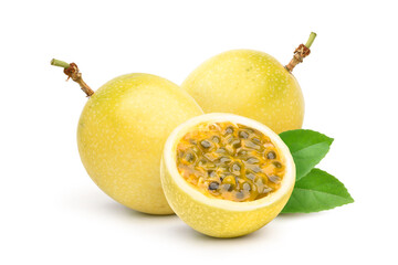 Yellow  passion fruit with cut in half and green leaf isolated on white background..